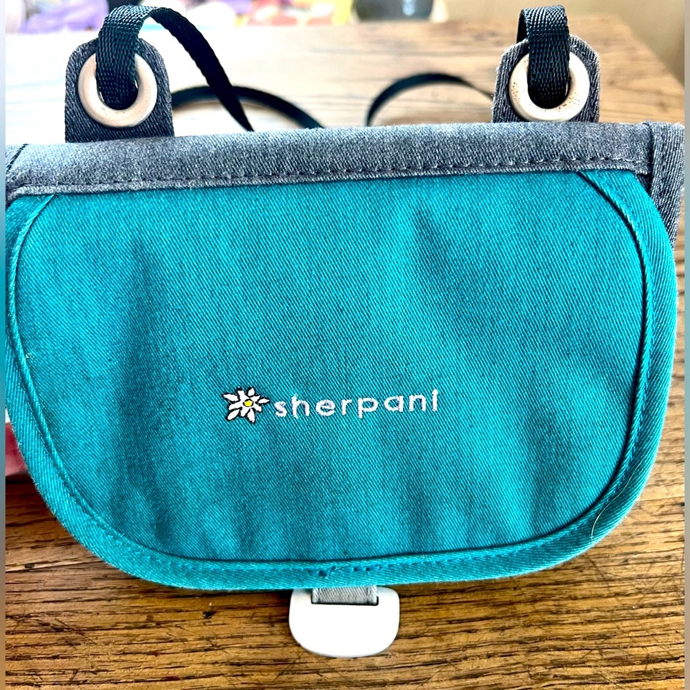Small Sherpani Cross body wallet.